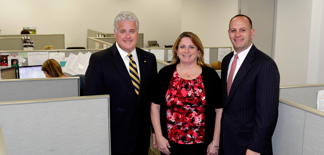 North Shore Bank President Kevin Tierney with Tarpey Insurance Group President Elizabeth Tarpey Kent and Steve Tarpey, Vice President of Tarpey Insurance Group