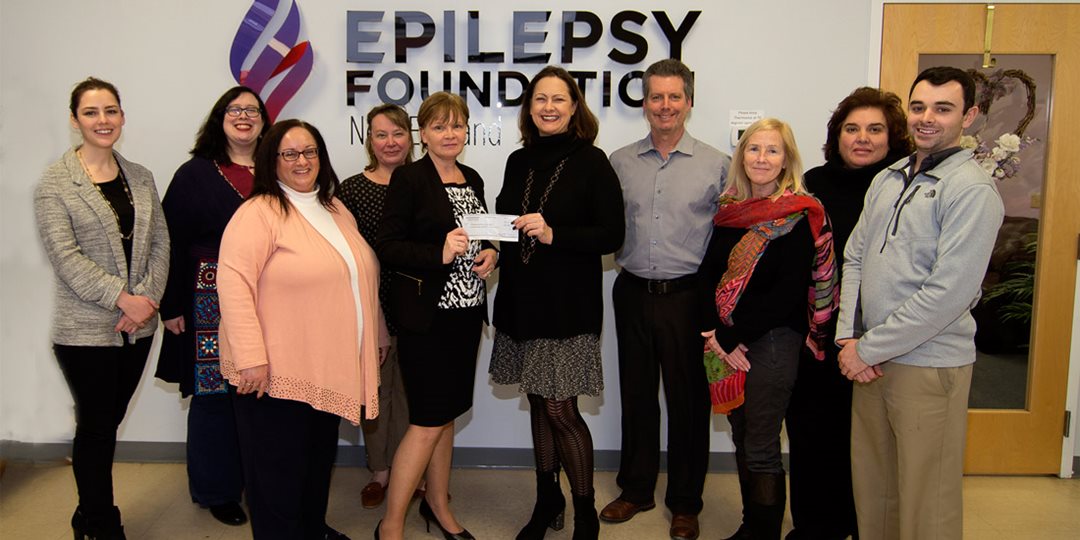 Photo of North Shore Bank presenting the Epilepsy Foundation of New England with a Jeans Day Donation