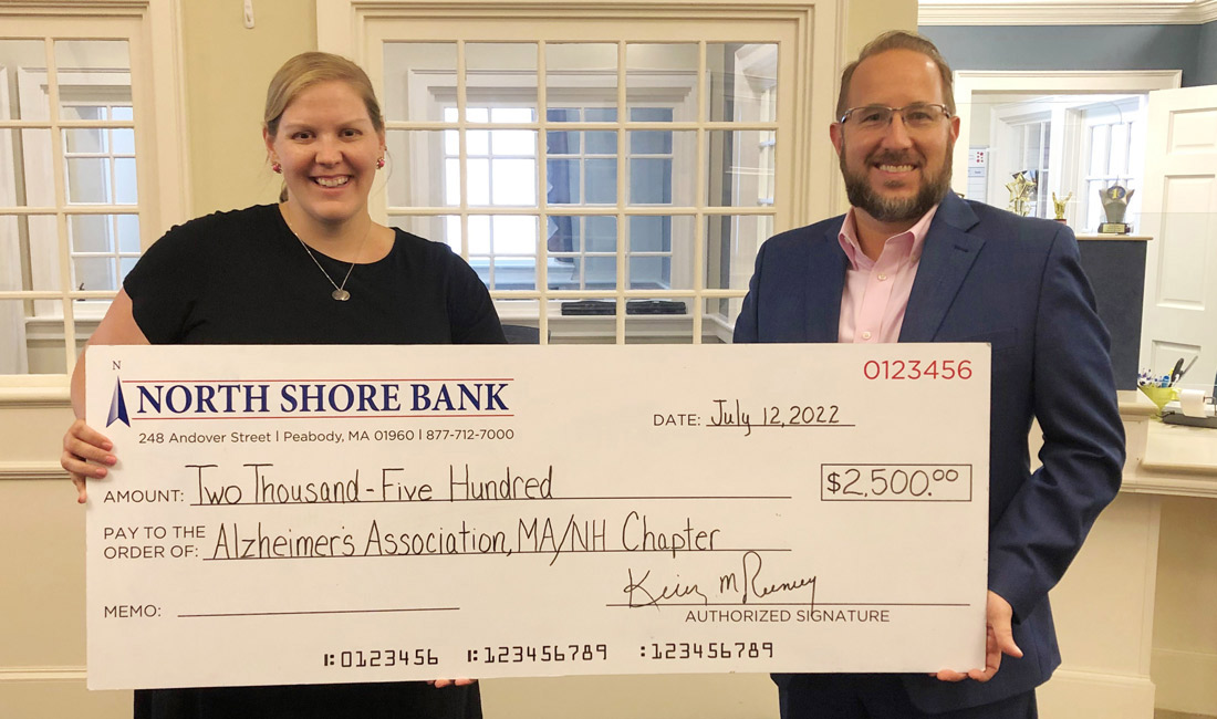 Photo of North Shore Bank presenting the Alzheimer's Association MA/NH Chapter with a $2,500 contribution towards their 2022 Walk.
