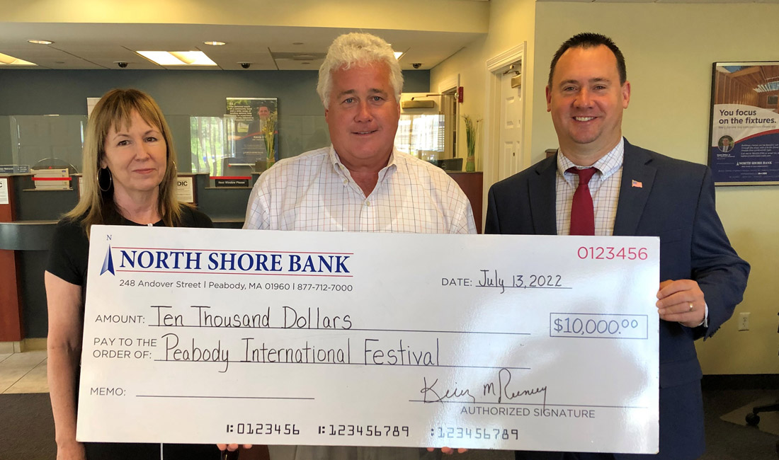 Photo of North Shore Bank presenting a $10,000 contribution to Peabody International Festival Committee