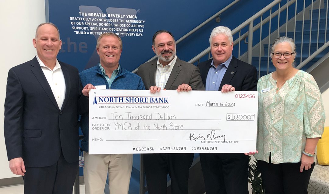 Photo of North Shore Bank presenting the Greater Beverly YMCA with a $10,000 contribution to their Golf Tournament fundraiser