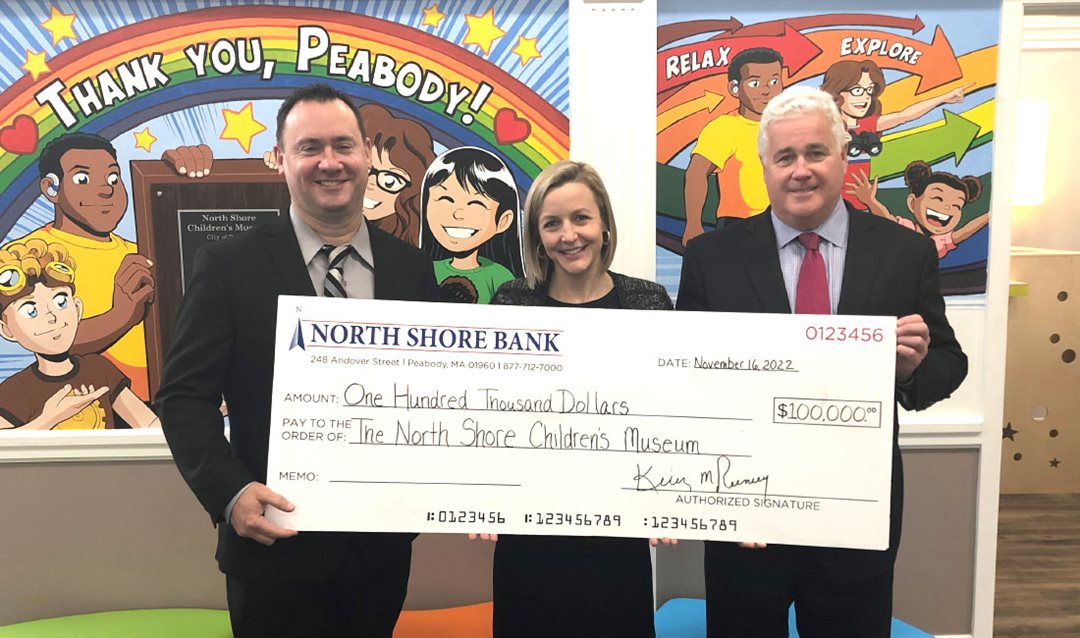 Photo of North Shore Bank presenting a $100,000 donation to the North Shore Children's Museum