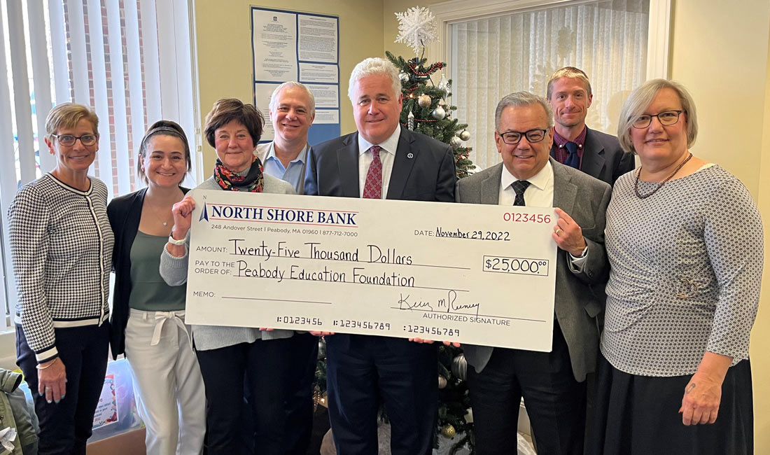 Photo of North Shore Bank presenting a $25,000 donation to the Peabody Education Foundation Mental Wellness Initiative