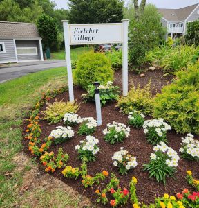 Fletcher Village Sign Among Beautiful Landscaping