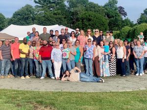 Group of Employees Outside Posing Together