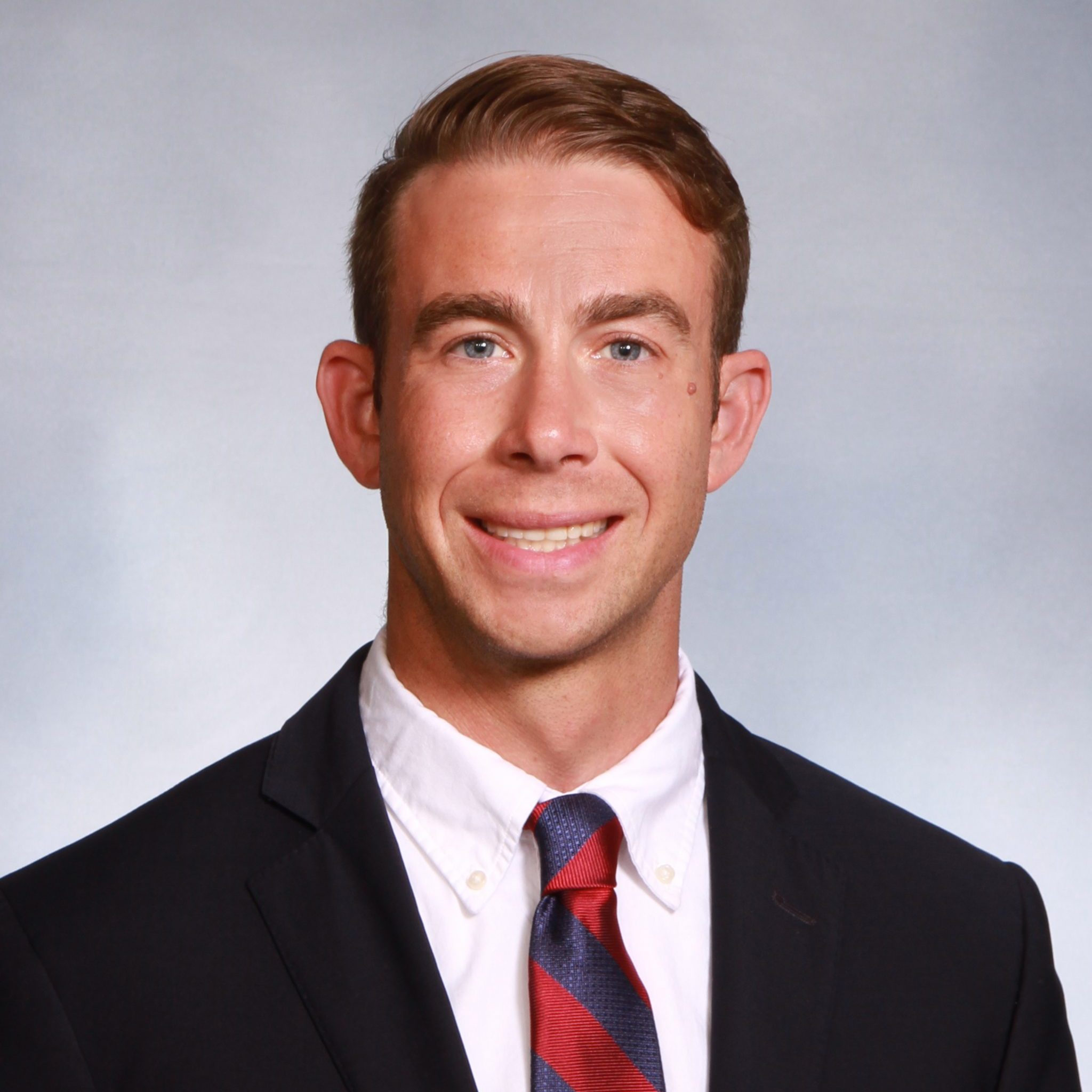 A headshot of Aaron Thomas.