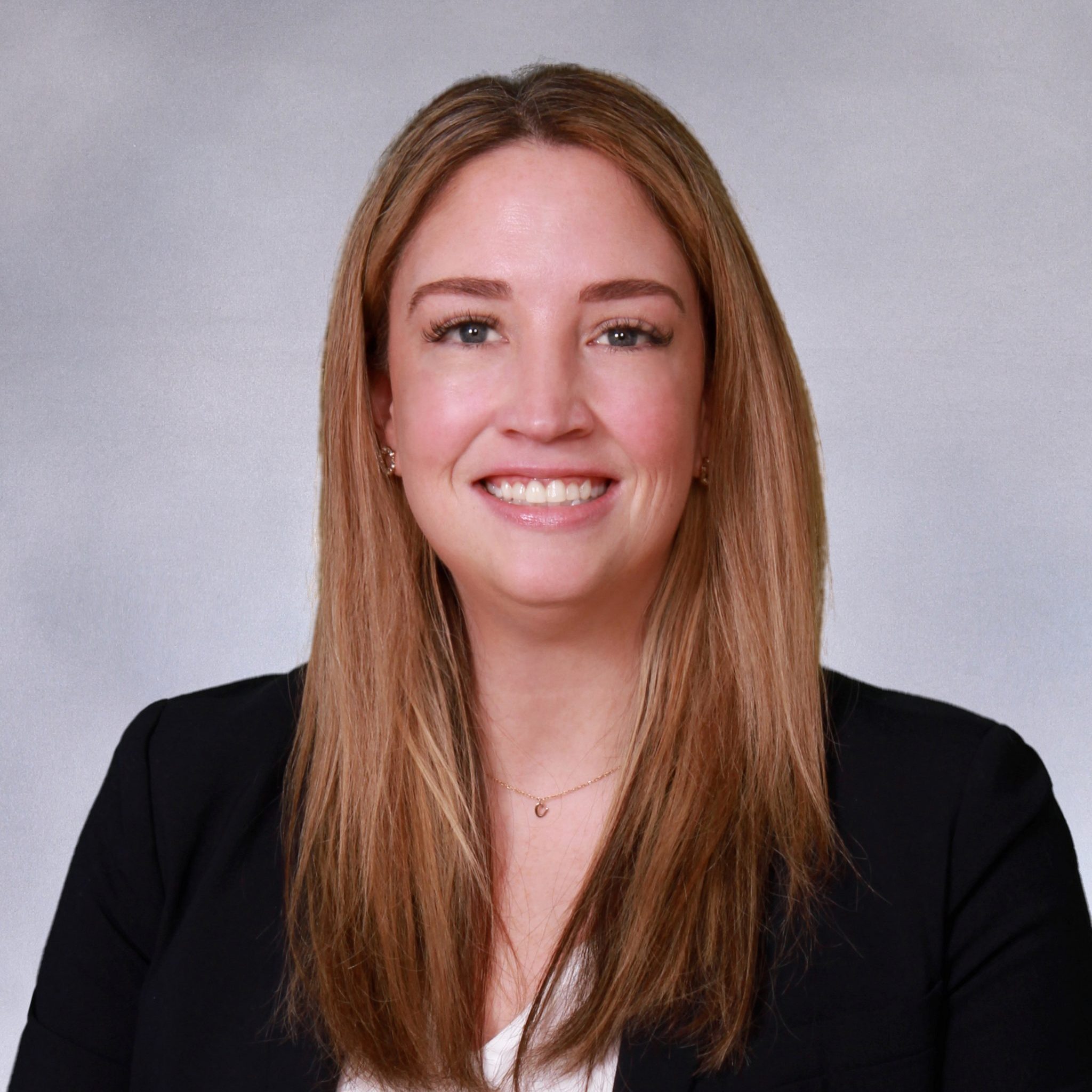 A headshot of Jessica Regan.